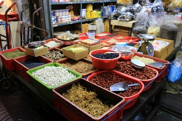 Bangkok, Thailand, July 2017. Inside the china town market a stand full of different colorful kind...