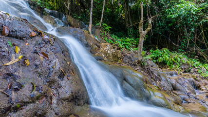 Pu Kang waterfall in the forest Chiang Rai province Thailand.