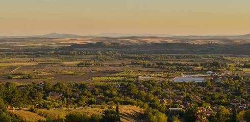 Fototapeta na wymiar Moments before sunset at the hills near Gavrailovo village.