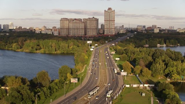 Aerial view of Moscow. Skyscrapers of housing complex Alye Parusa over Moskva River. Stroginsky bridge. Moscow, Russia. 4k