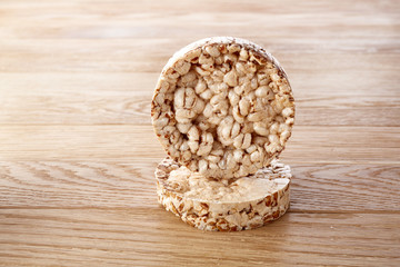 Stack of crispbreads on light wooden table