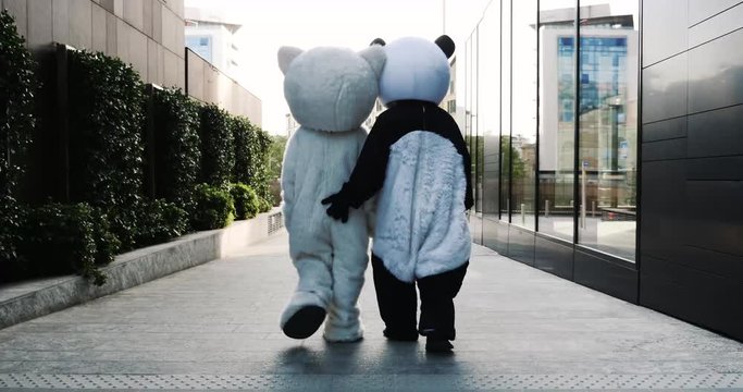 Panda and teddy bear around in the city