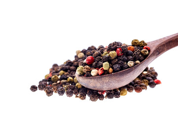 Seasoning - four kinds of pepper peas - isolated on white background