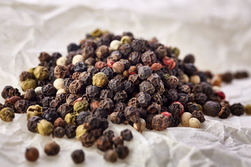 black pepper peas on a wooden spoon