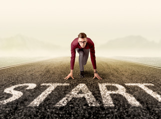 Businessman at start line