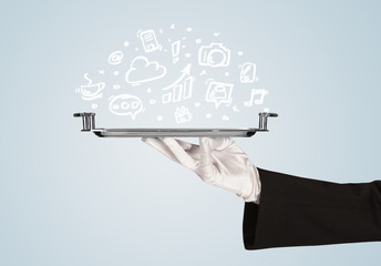 Waiter holding tray with media icons