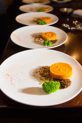 pumpkin cat-cat with rice popcorn and fruit sorbet and sponge made of parsley