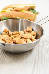 Roasted chicken meat in a pan.