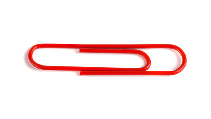 Red paper clip isolated on white background