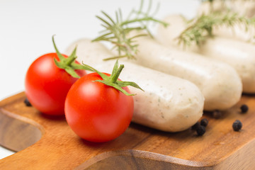 sausages with tomato and rosemary