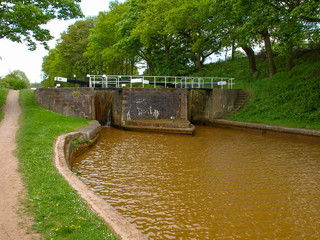 Red Bull Lock - dual lock on the Trent and Mersey canal near Stoke-on-Trent in Staffordshire, England. View of the bottom gates.