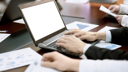 Man typing on laptop at meeting, team manager making business presentation