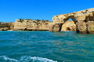Fototapeta na wymiar boat trip along the coast in Benagil to grottos and caves, Algarve
