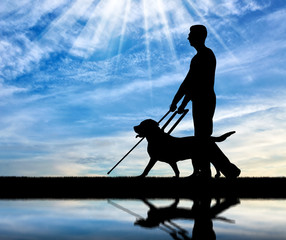 Concept of blind people with guide dog