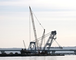 Cranes Working on Bridge