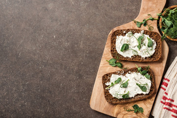 Rye bread with cheese cream and pea sprouts © ffphoto