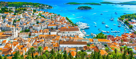 Hvar island panorama landscape. / Panorama of amazing coastal town Hvar in Croatia, popular...