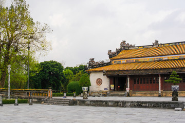 The Thai Hoa Palace and the courtyard in front of it facing towards Thai Dich Lake in the Imperial City, Hue, Vietnam
