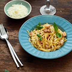 Plate fresh homemade pasta carbonara wooden table