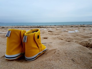 Obraz premium Bottes sur le sable