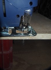 Chipboard sawn PR using an electric jigsaw.