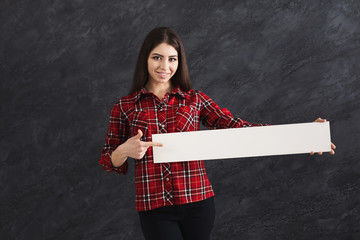 Young woman with blank white paper