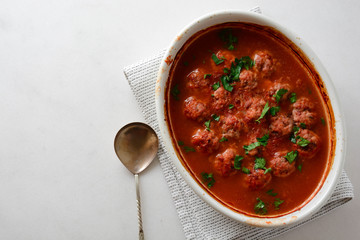 Meatballs in sweet and sour tomato sauce. Top view