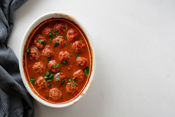 Meatballs in sweet and sour tomato sauce. Top view