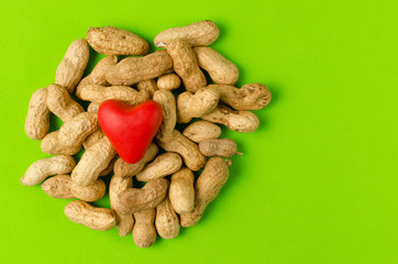 I love peanuts, nuts on a bright green background.