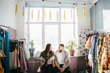 young couple spending time sitting and having fun