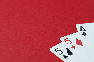 Playing cards. Red background, empty space for text