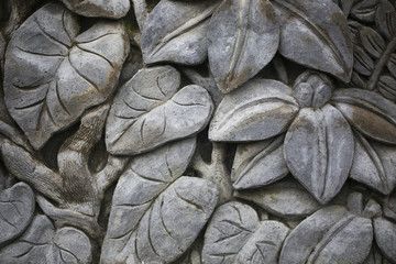 Ornamental bas-relief of a jungle carved in an old tree