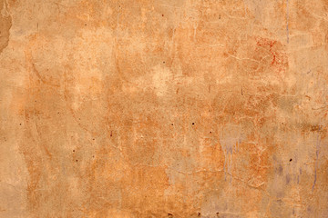 Wall fragment with scratches and cracks