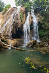 Fototapeta na wymiar Upper tier of the Dat Taw Gyaint (also known as Anisakan) Waterfall near Mandalay in Myanmar (Burma) on a sunny day.
