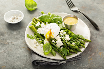 Green peas and asparagus with poached egg