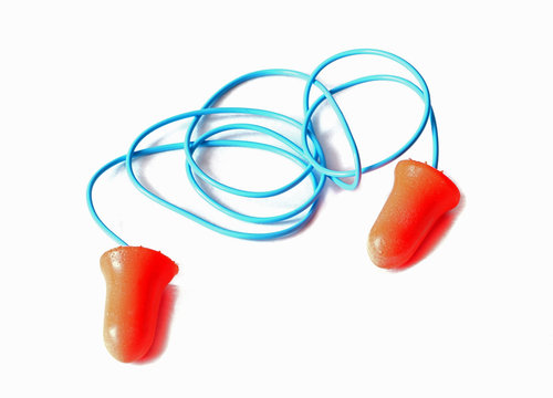 Earplugs to reduce noise, orange foam earplugs with blue wire, isolated on  white background Stock Photo | Adobe Stock