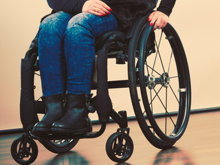 Disabled young girl on wheelchair.