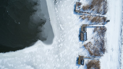 Amazing aerial shot about a frozen lake.