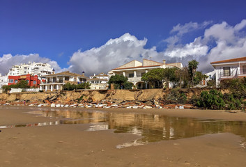 Fototapeta na wymiar View of damaged beach homes in Punta Umbria, Huelva, Southern Spain, after the storm.
