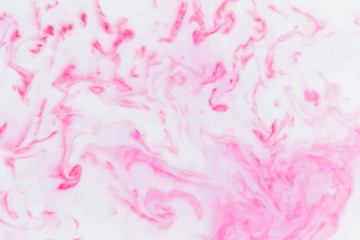 Fototapeta premium Abstract pink white background, pink watercolor pattern, colored stains on liquid, pop art texture, minimalist background for designer, pink paint in liquid, blank for fabric design