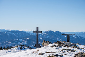 Panoramic snowy landscape scenic view from summit of mountain Rennfeld