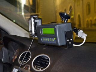 Fototapeta na wymiar Taxi meter and navigator