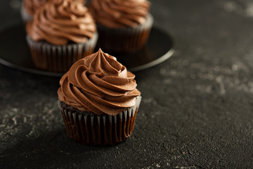 Dark chocolate cupcakes with ganache frosting