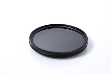 Lens filter reflex polarized filter in a white background