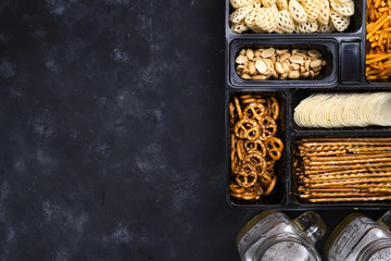 Beer and Snacks on Black Chalkboard