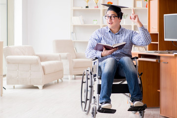 Disabled student studying at home on wheelchair