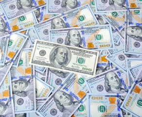 background of dollar bills, many hundred dollar bills