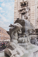 In Catania, the Amanano fountain is located on the south side of Piazza del Duomo and opposite the Palazzo degli Elefanti