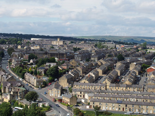 panoramic view of Halifax in west yorkshire with rows of terraced streets buildings roads and...