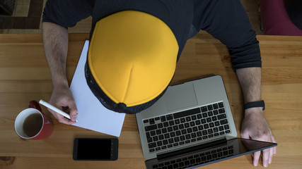 Kid working at his desk